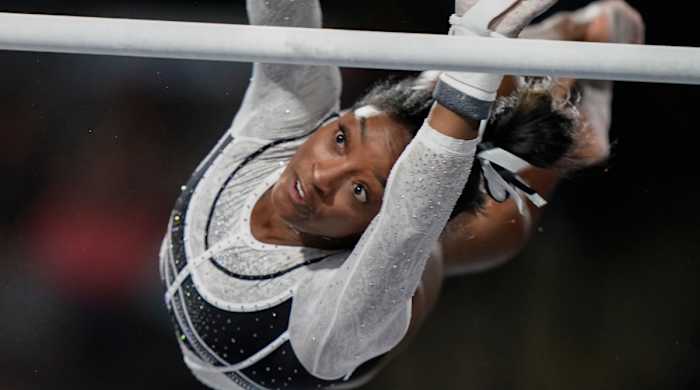 Simone Biles warms up at the U.S. Classic gymnastics competition in August 2023.
